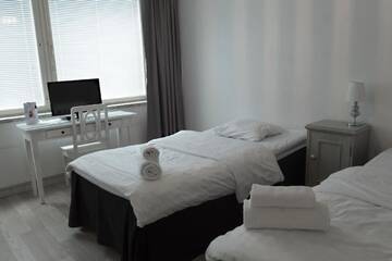 Фото номера Двухместный номер с 2 отдельными кроватями Апарт-отели Hotelli Alexanderin huoneistohotelli huoneet г. Мянття 11