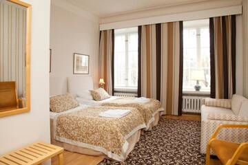 Фото номера Двухместный номер с 2 отдельными кроватями Отель Hotelli-Ravintola Mäntän Klubi г. Мянття 6